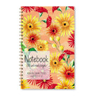 Notebook with yellow, red, and orange daisies and wildflowers.