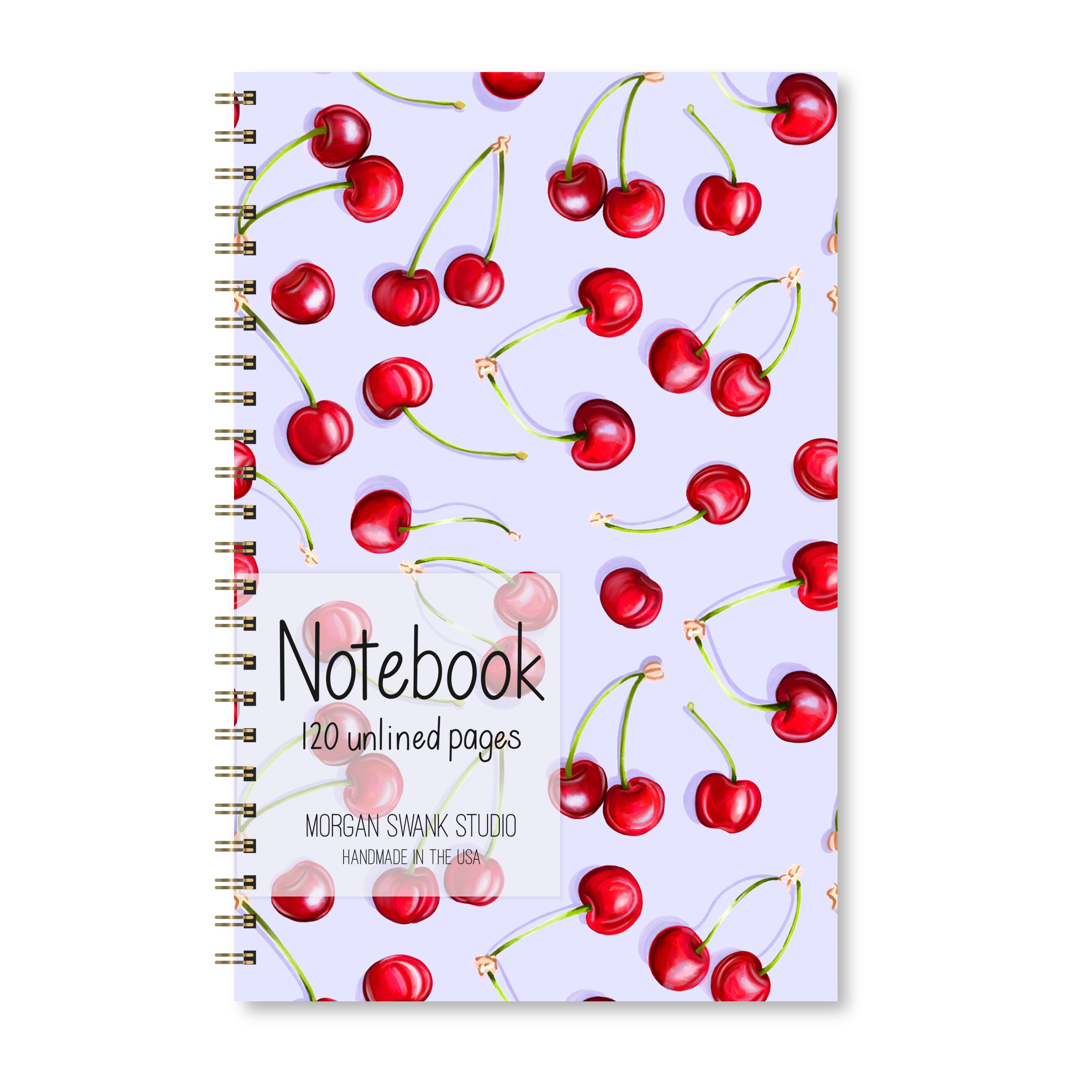 Notebook with bright red cherry illustrations on a light purple background.