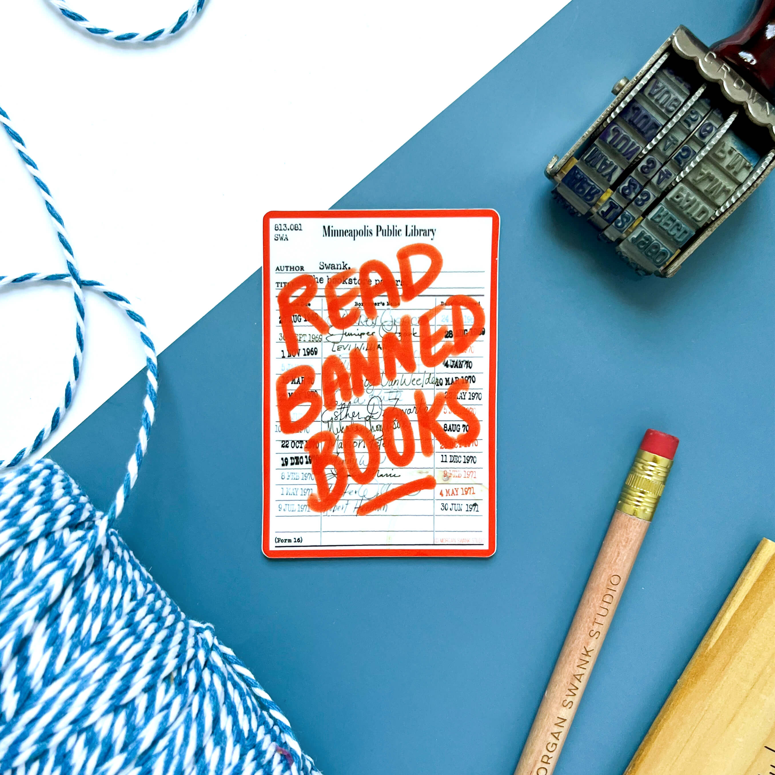 “Read Banned Books” waterproof sticker with vintage library card background in bold red text