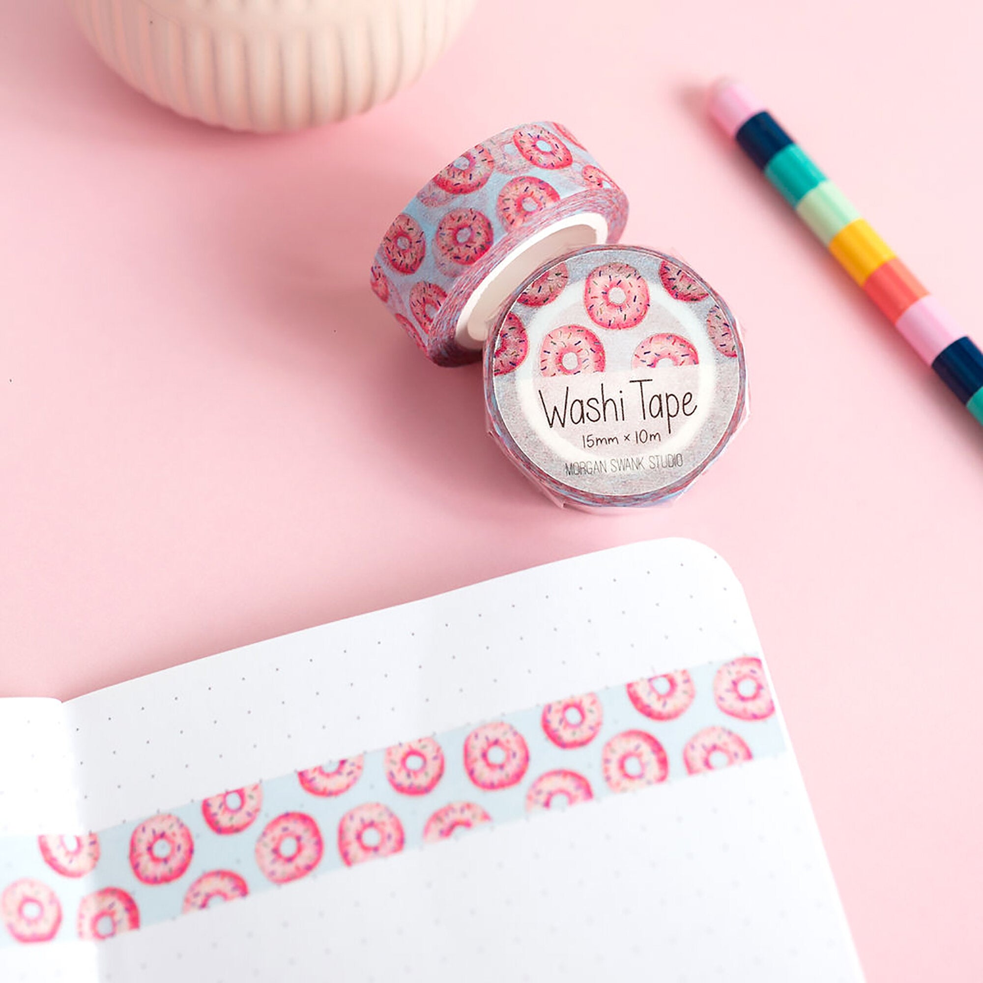 Blue washi tape with repeating pink donut illustrations