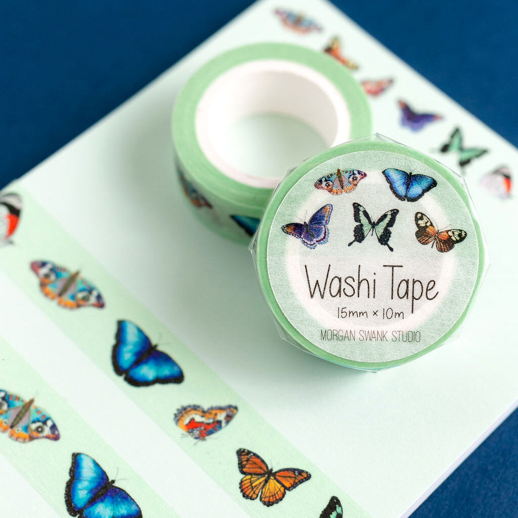 Green washi tape with detailed illustrations of colorful butterflies
