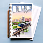 Notebook with a Richmond, VA cityscape and train illustration.