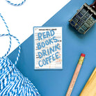“Read Books, Drink Coffee” blue waterproof sticker with vintage library card background